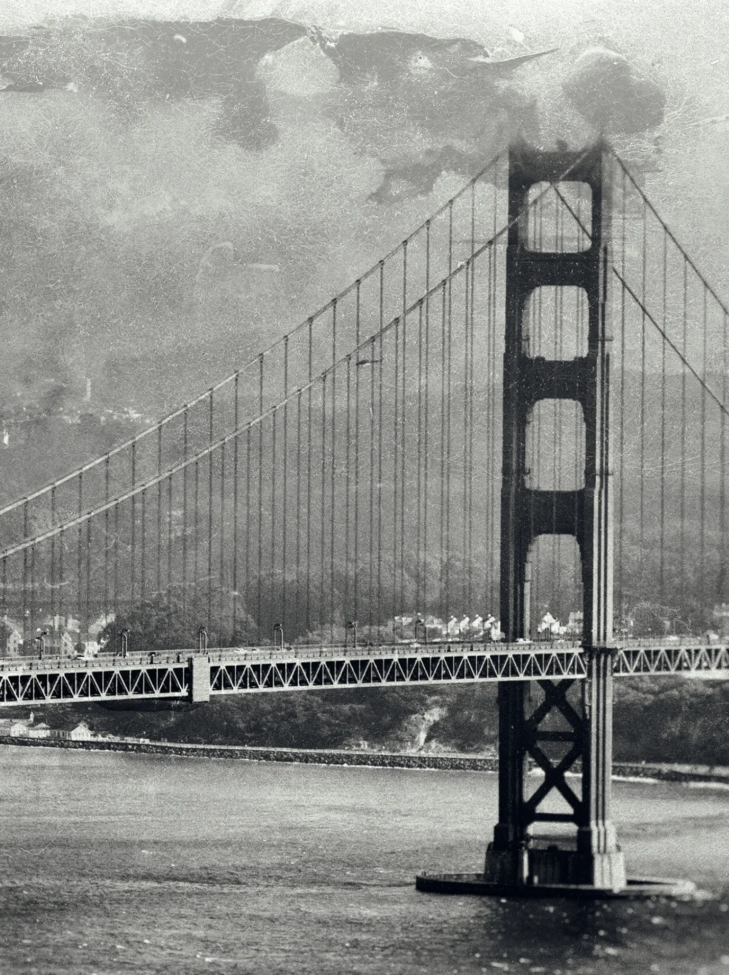 Historic view of San Francisco Bay Bridge in black and white