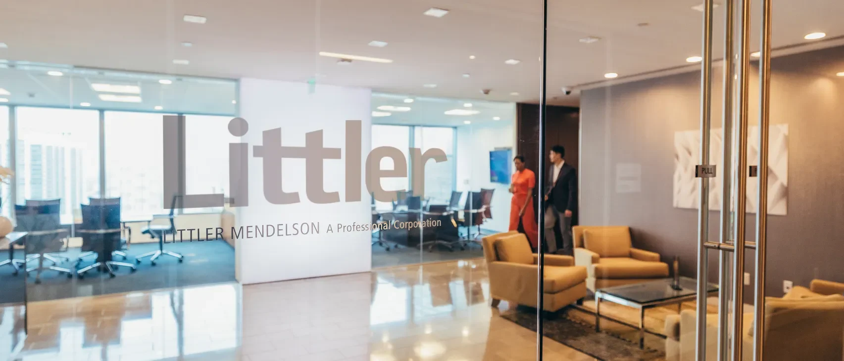Littler office space glass doors into lobby