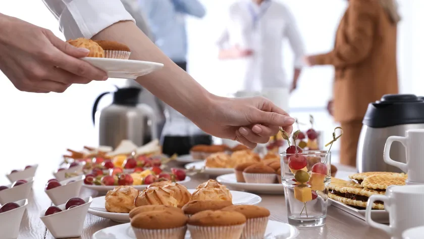 event attendees at a breakfast buffet