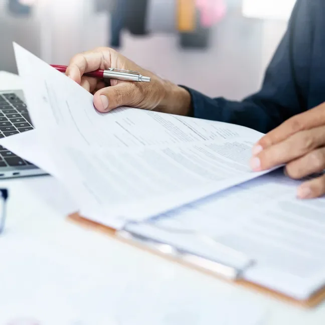 Hands with paperwork document review