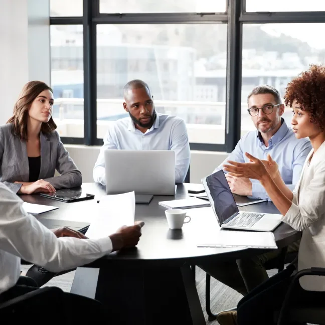 Project team seated around a table