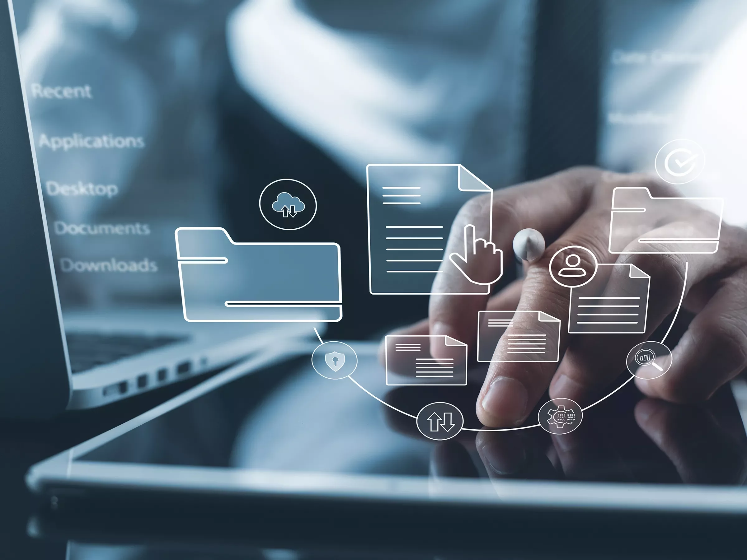 eLearning digital graphics over a screen with a person's hand
